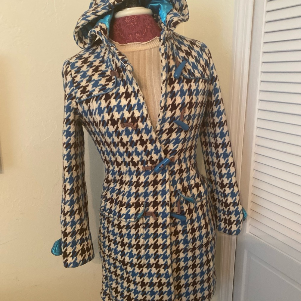 Black and White Trench Coat with Houndstooth Pattern and Turquoise Accents